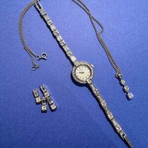 Bulova watch and necklace set
